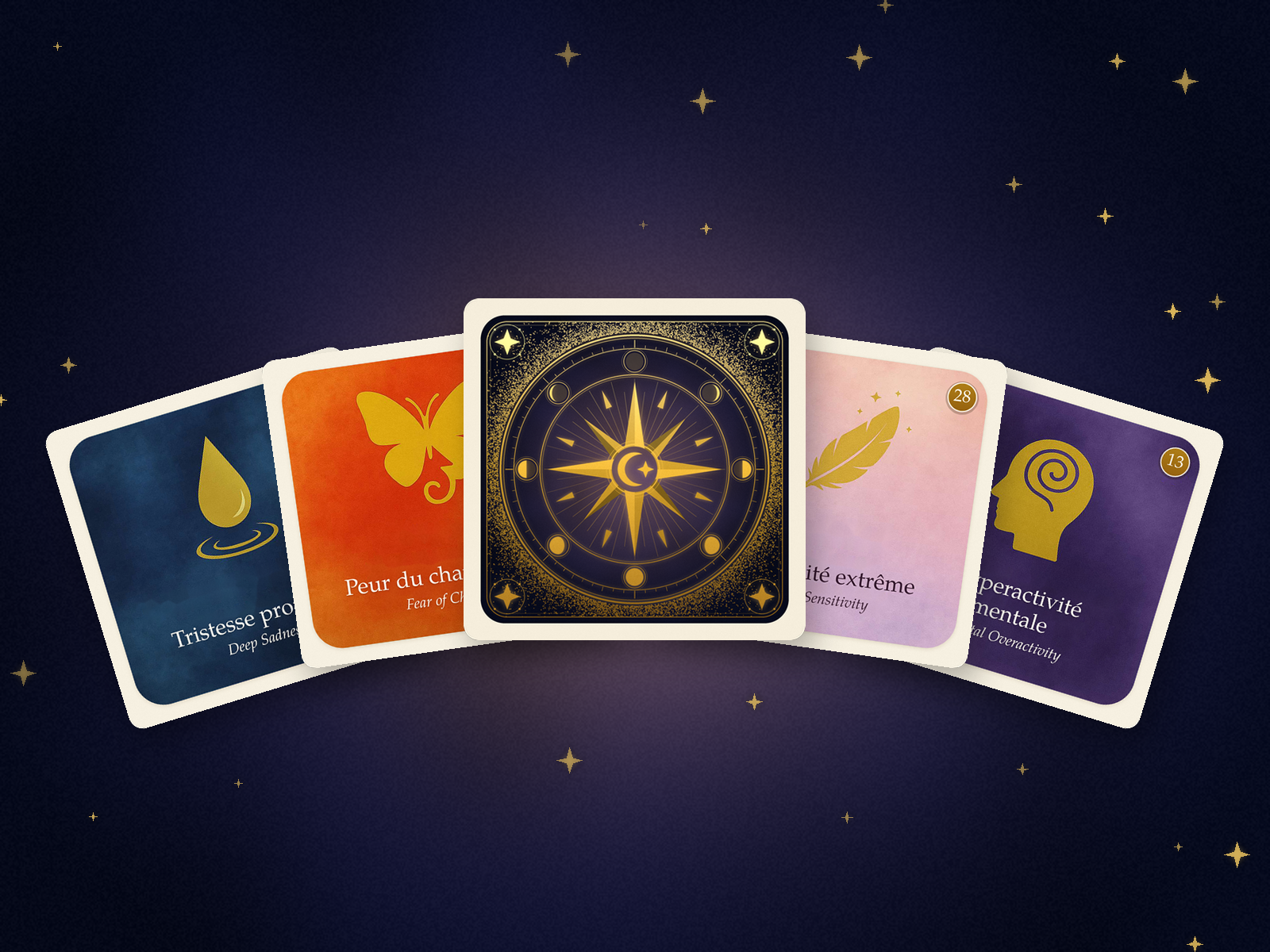 Éventail de cartes de l'oracle holistique, avec le dos doré orné d'une rose des vents au centre